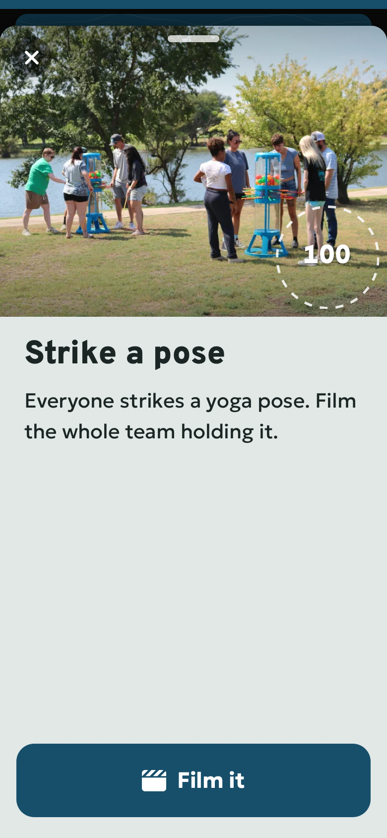 Film it: Strike a pose. Everyone strikes a yoga pose. Film the whole team holding it. Poster preview of the Passport challenge screen.
